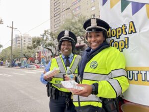 Adopt A Cop Truck with 2 Female NOPD Officers