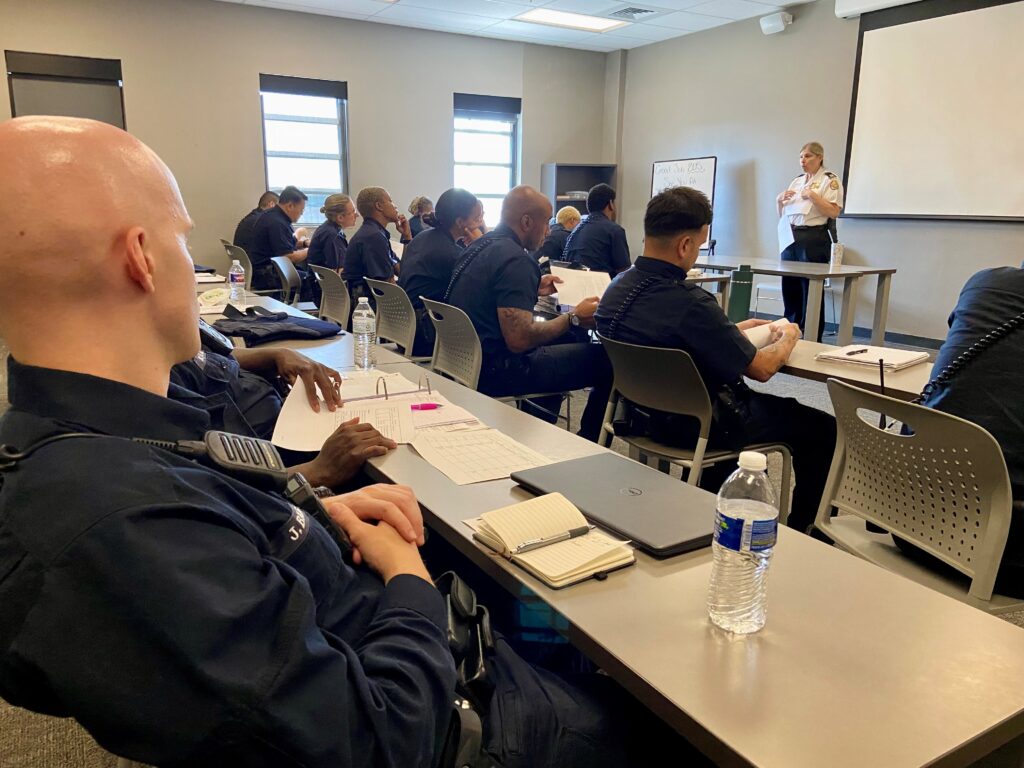 Captain Gwen Nolan teaches career planning to recruits at the NOPD Academy with NOPJF